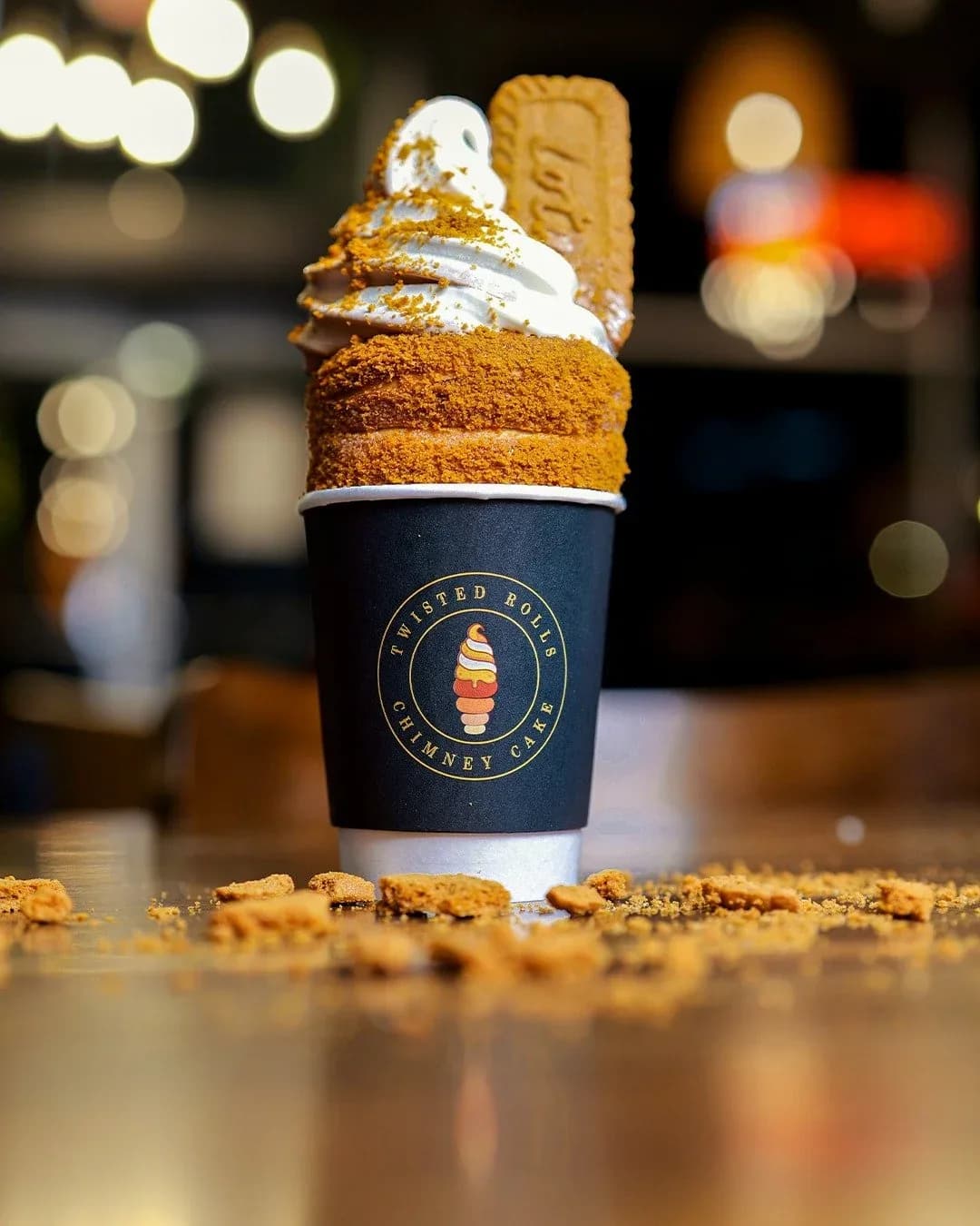Lotus chimney cone with soft serve and biscuit crumb