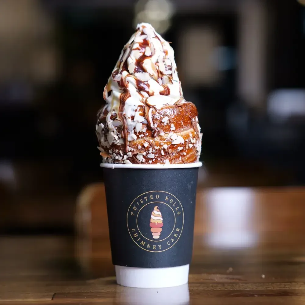 Almond chimney cone with cream and drizzle
